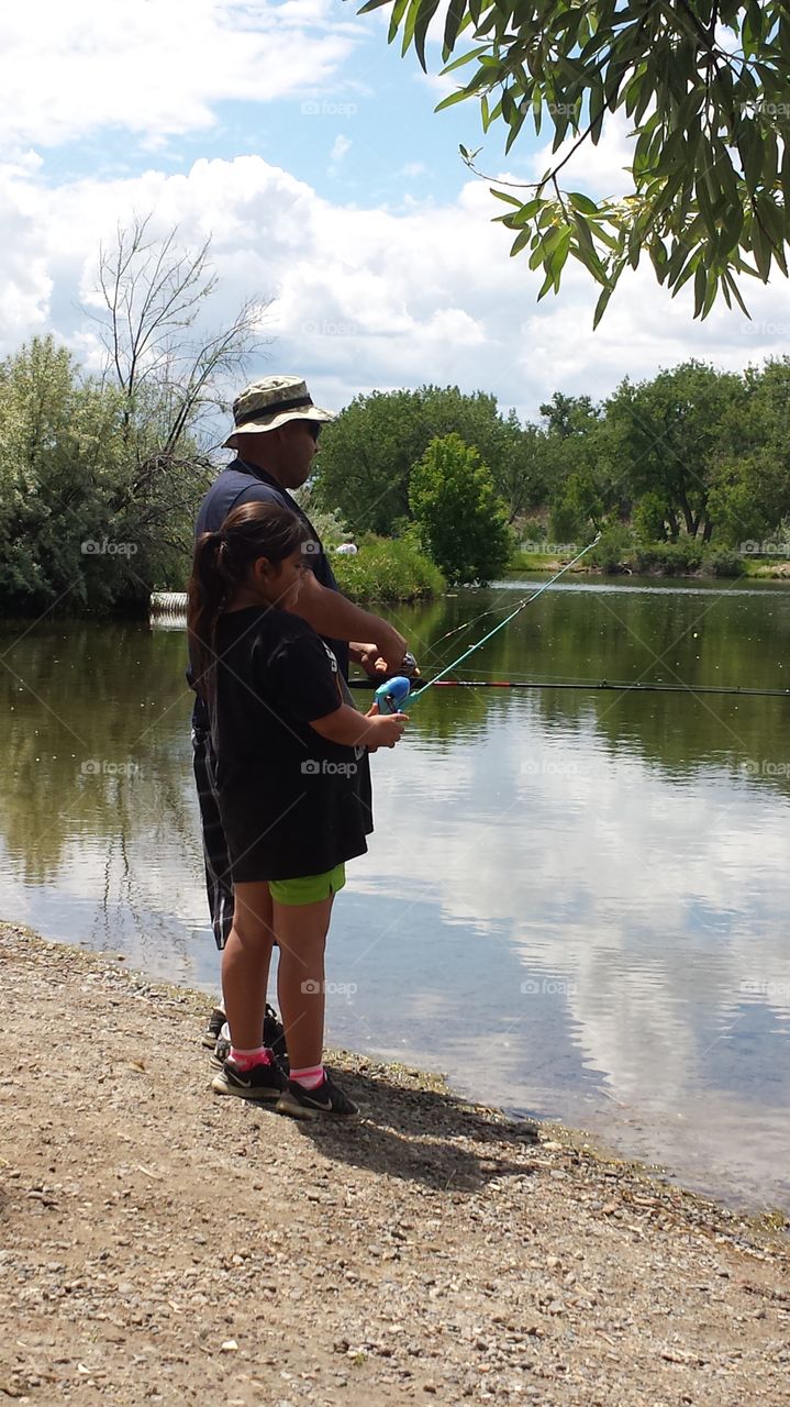 daddy and daughter fishing