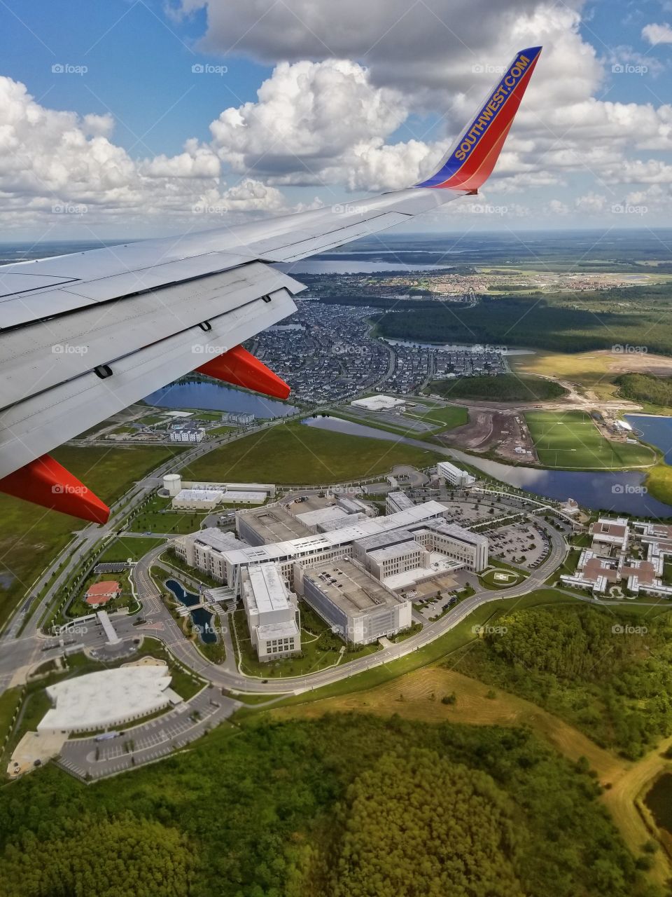 This is one of my favorite flight photos..The building almost looks like a transformer semi