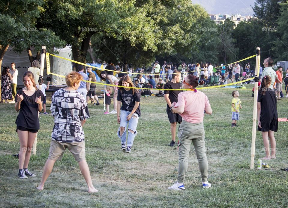 Playing volleyball outdoor