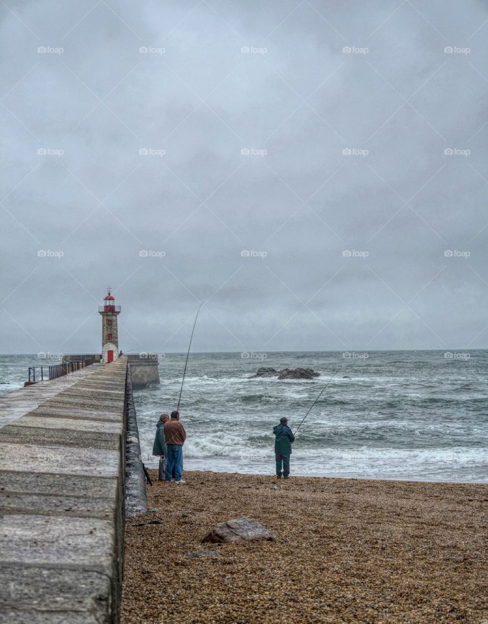 Fishermen. A small group of Fishermen trying their luck.