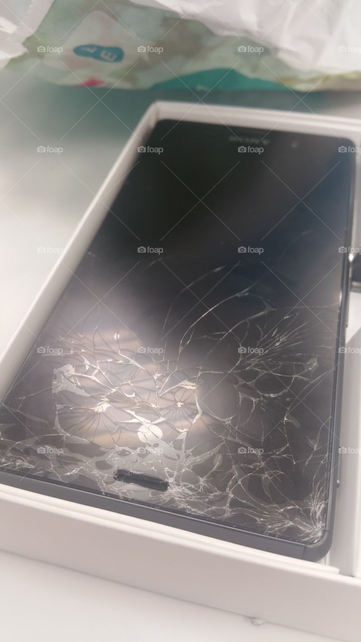 cracked screen. brand new phone. crack. 