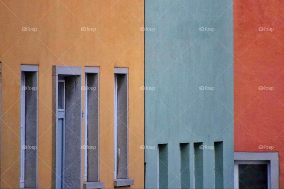 Close-up of colorful houses in a row