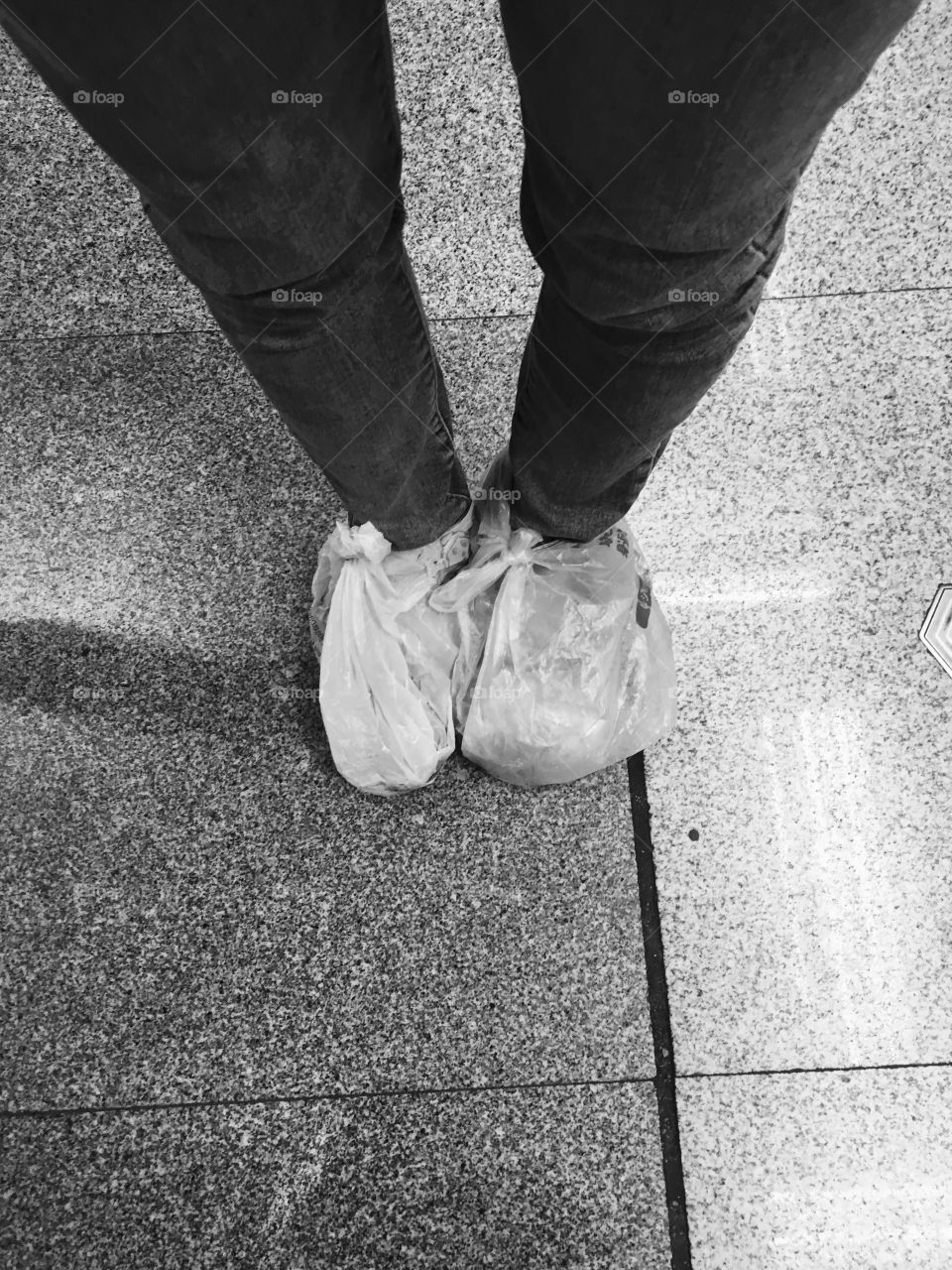 Chinese Girl with Plastic Bags on Her Feet