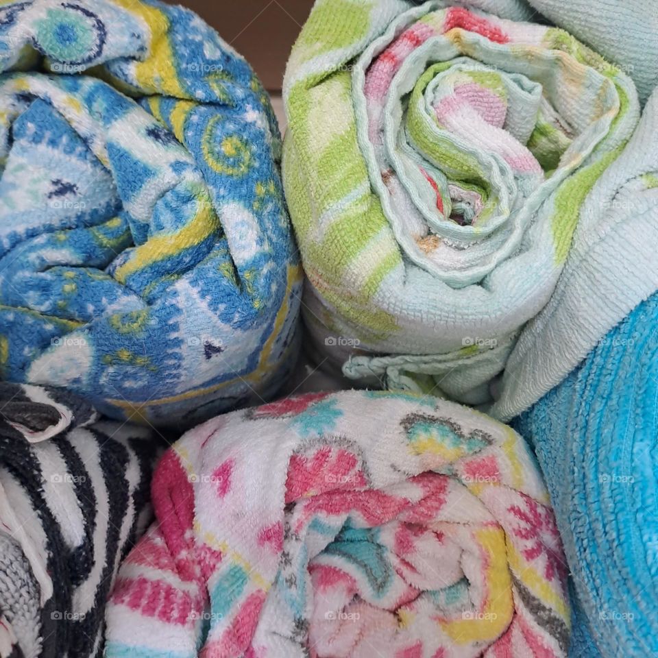 colourful rolled towels