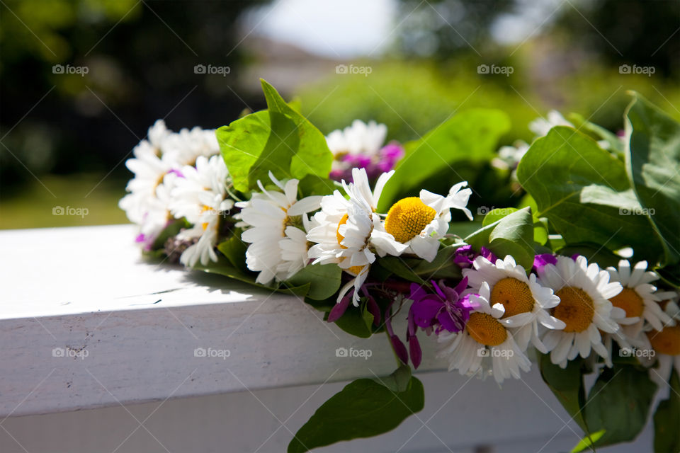 Close-up of white flower garland 