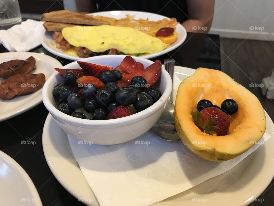 Fruit bowl, papaya, berries, strawberries 