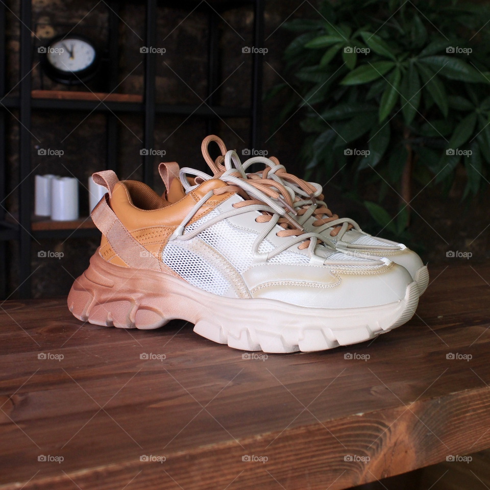 Orange sneakers are ready to move and run!