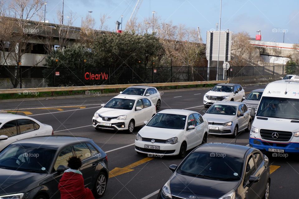 cars stuck in traffic during the rainy season