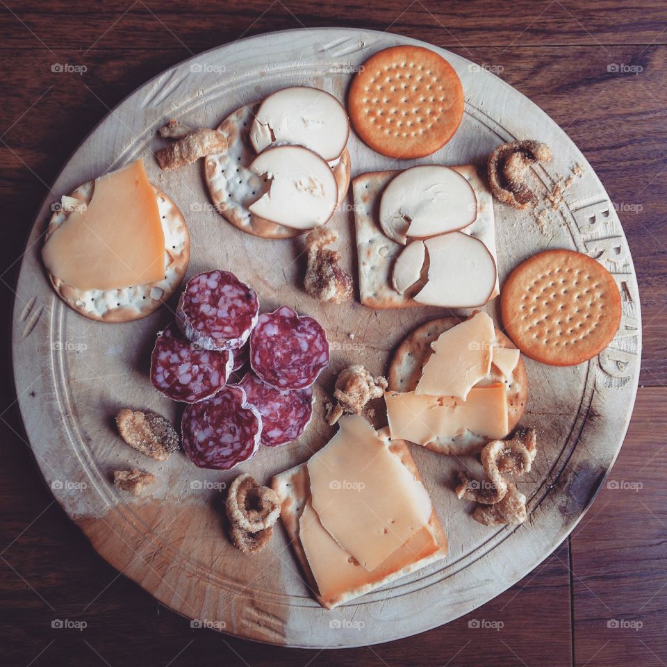 Meat and cheese in the plate
