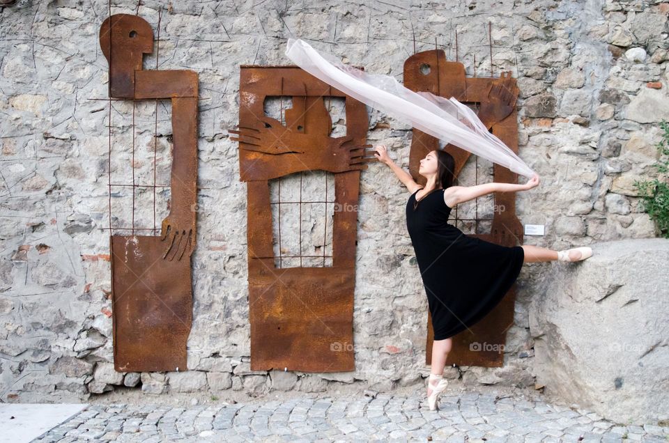 Young Female Ballerina Dancing with a Scarf Outside