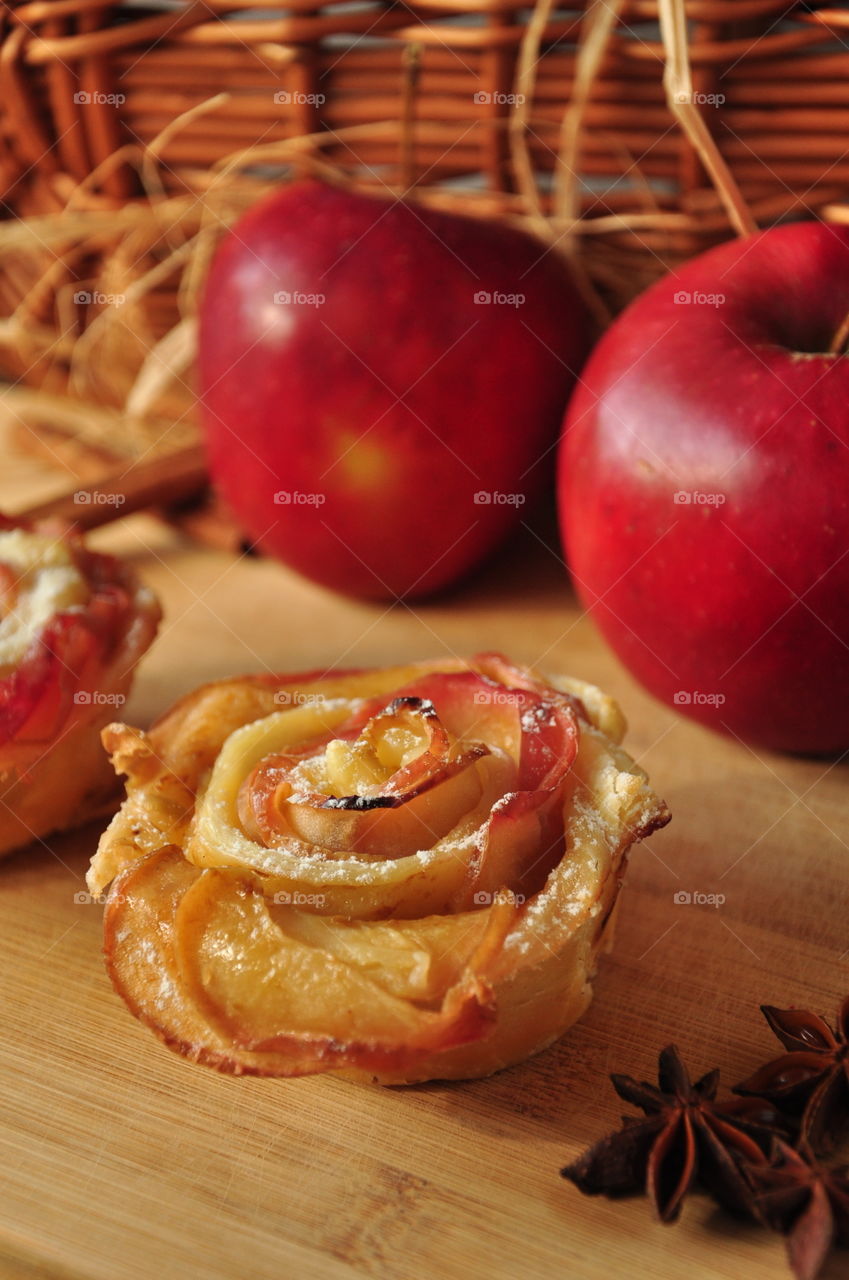 baked red apple muffin dessert with apples anis closeup in autumn winter season