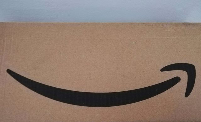 Amazon logo on a cardboard box