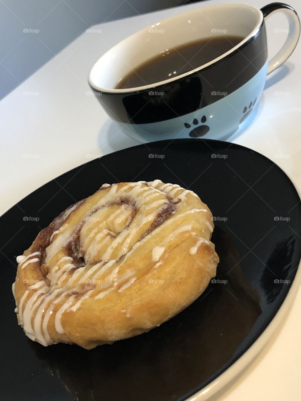 Cinnamon roll and coffee