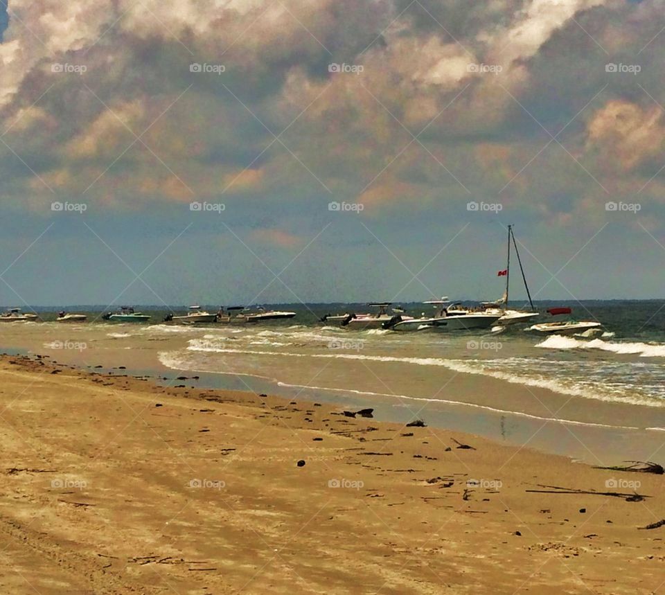 Boats Anchored in water