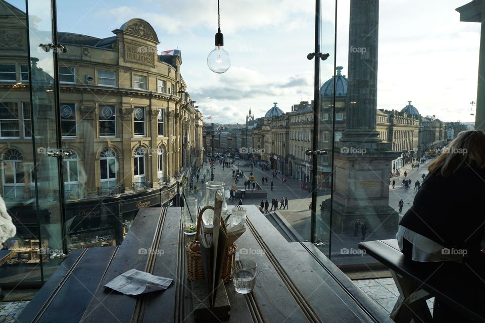 Wonderful city view from a floor to ceiling glass window 