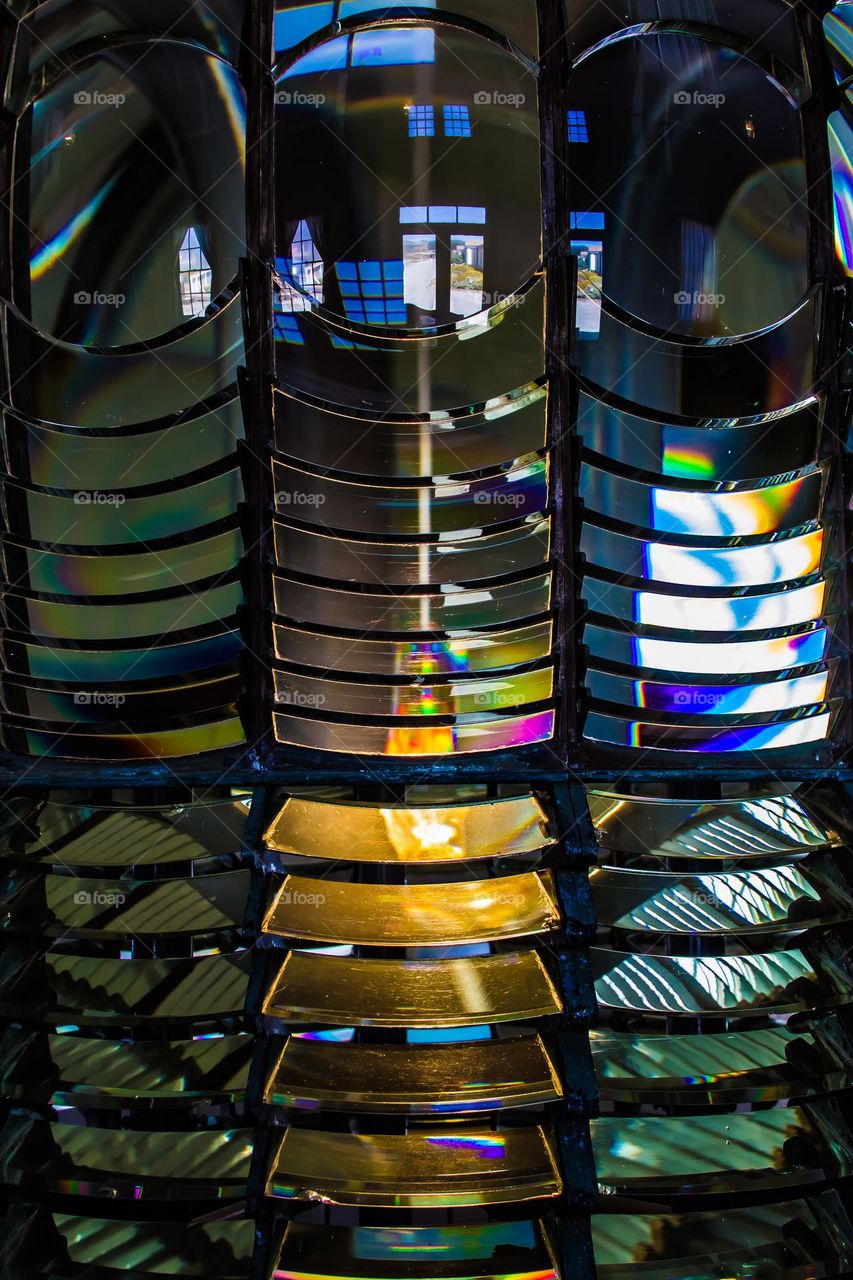 Colorful closeup of the Pigeon Point Lighthouse glass prism First Order Fresnel Lens in pescadero california between Santa Cruz and San Francisco 