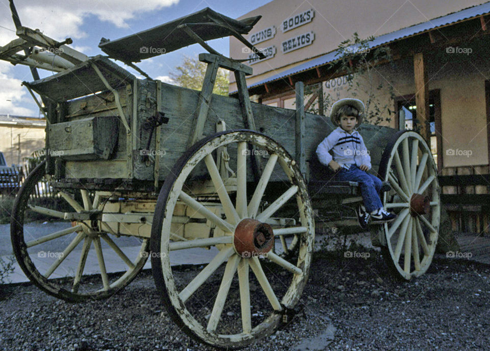 Tombstone Arizona child on a wagon