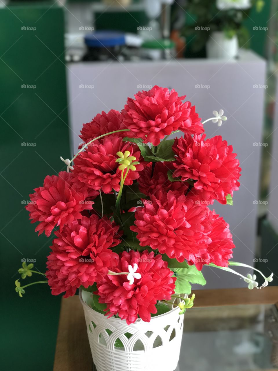 Beautiful flower vase. Closeup shot. I am in love with this pic. Vibrant bright red. Home decoration on the go!!