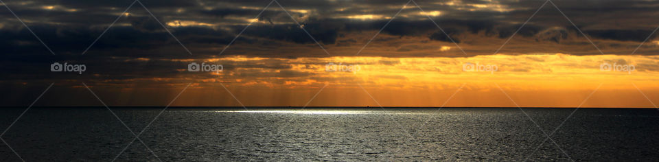 Scenic view of sunset over sea