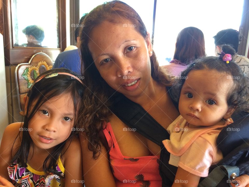 My partner with our two girls on our travels in the Philippines in June 2017.