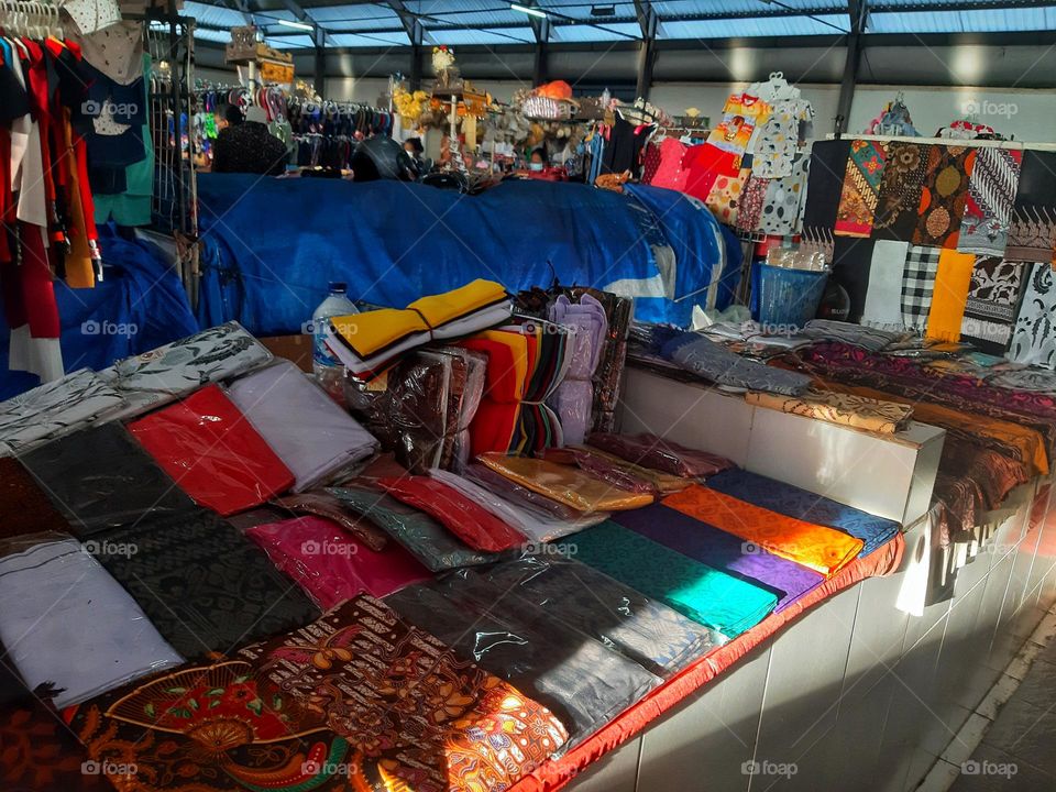 colorful product of local textil industry sold in the market.