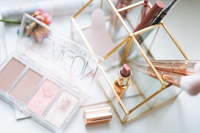 Makeup products on window sill