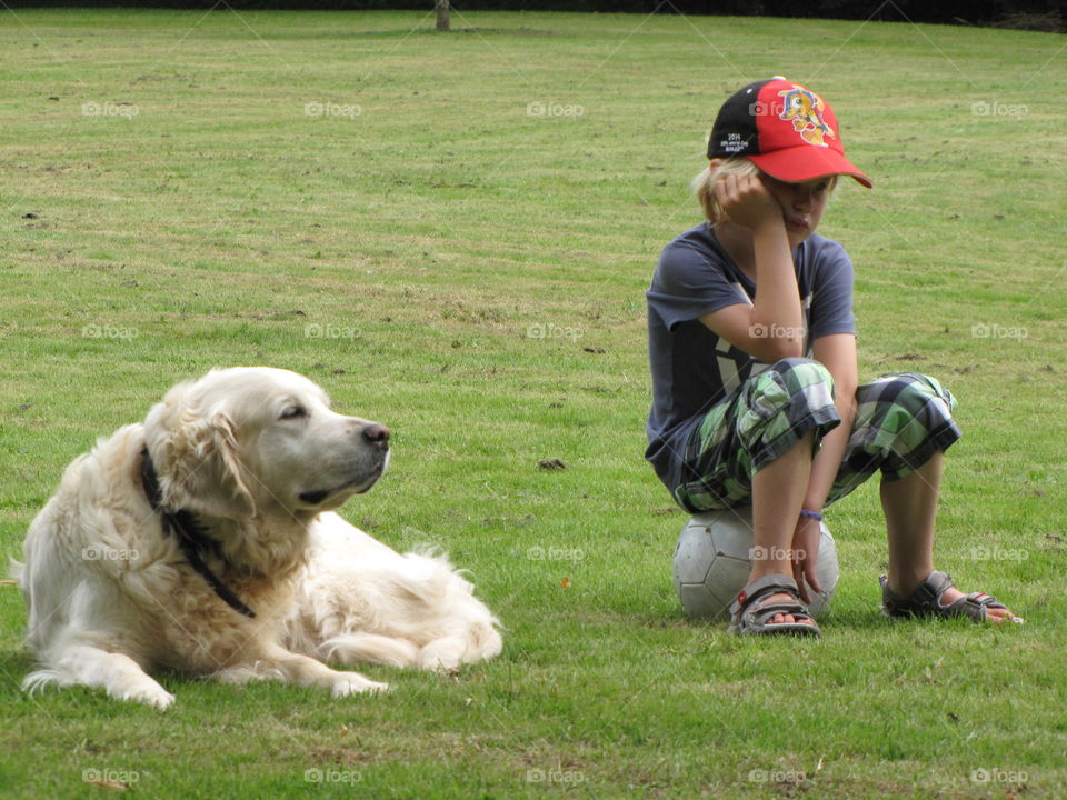 Boy in company of his dog
