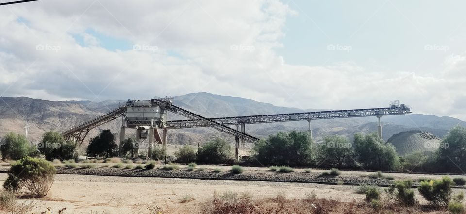 Giant machinery for mining/quarrying.
Large metal contraption.