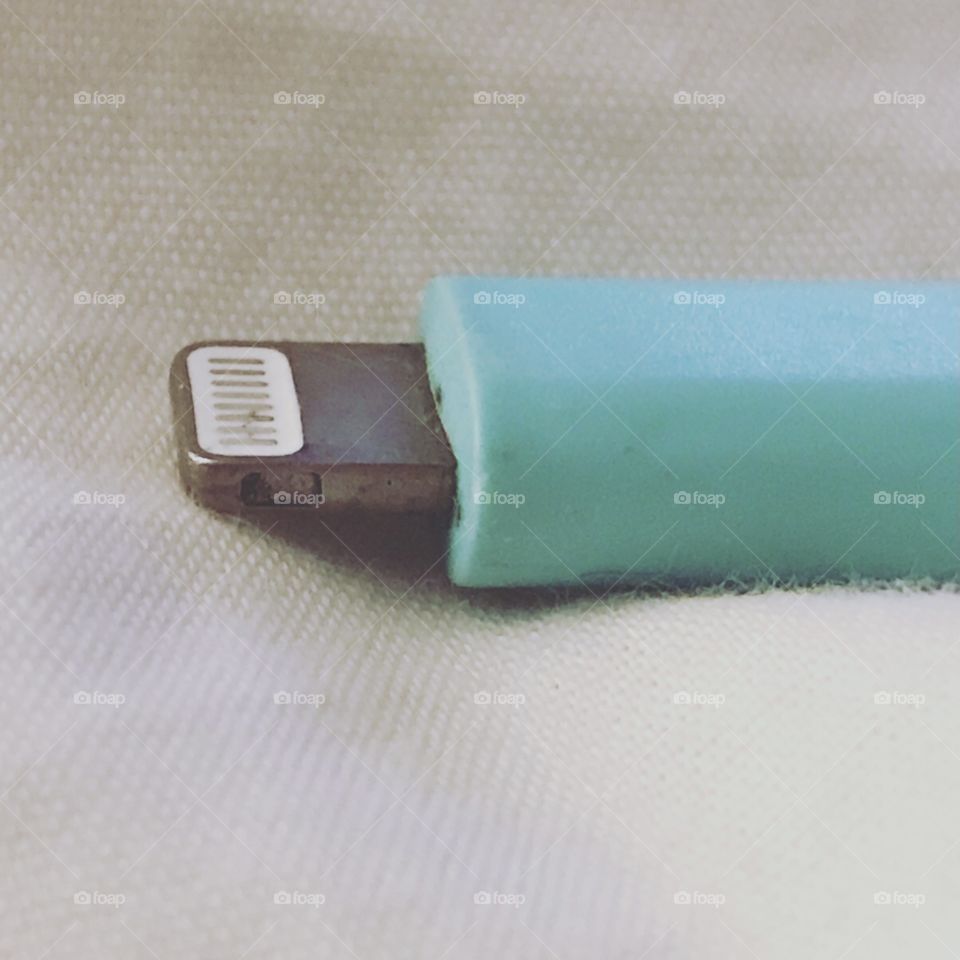 IPhone charging cord tip.