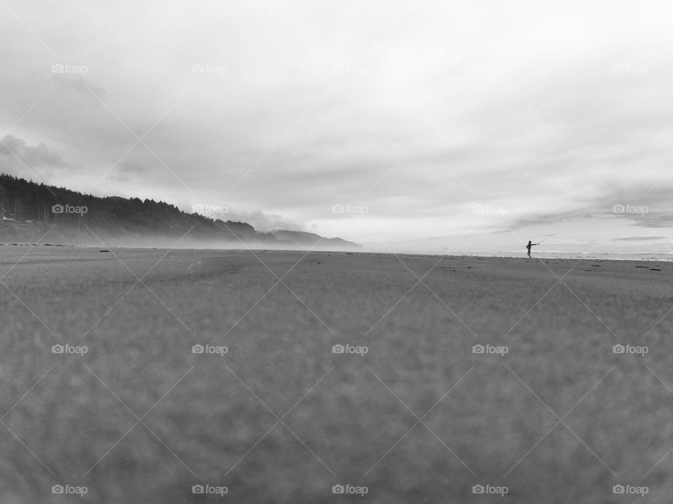 Casting my line off the shores of cannon beach Oregon into the mighty pacific to catch some fresh fish for dinner 