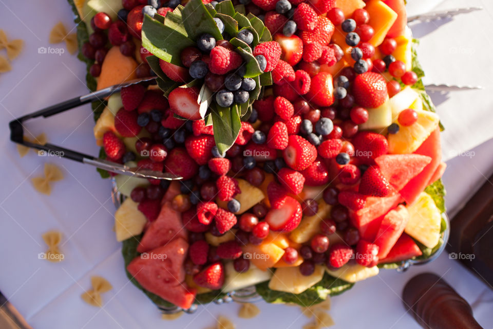 Fruit salad bowl. Square fruit salad bowl outdoors 