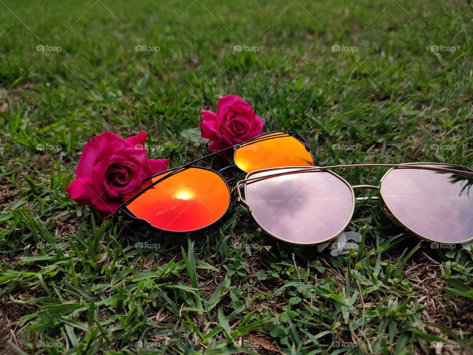 Sunglasses with sky reflection,