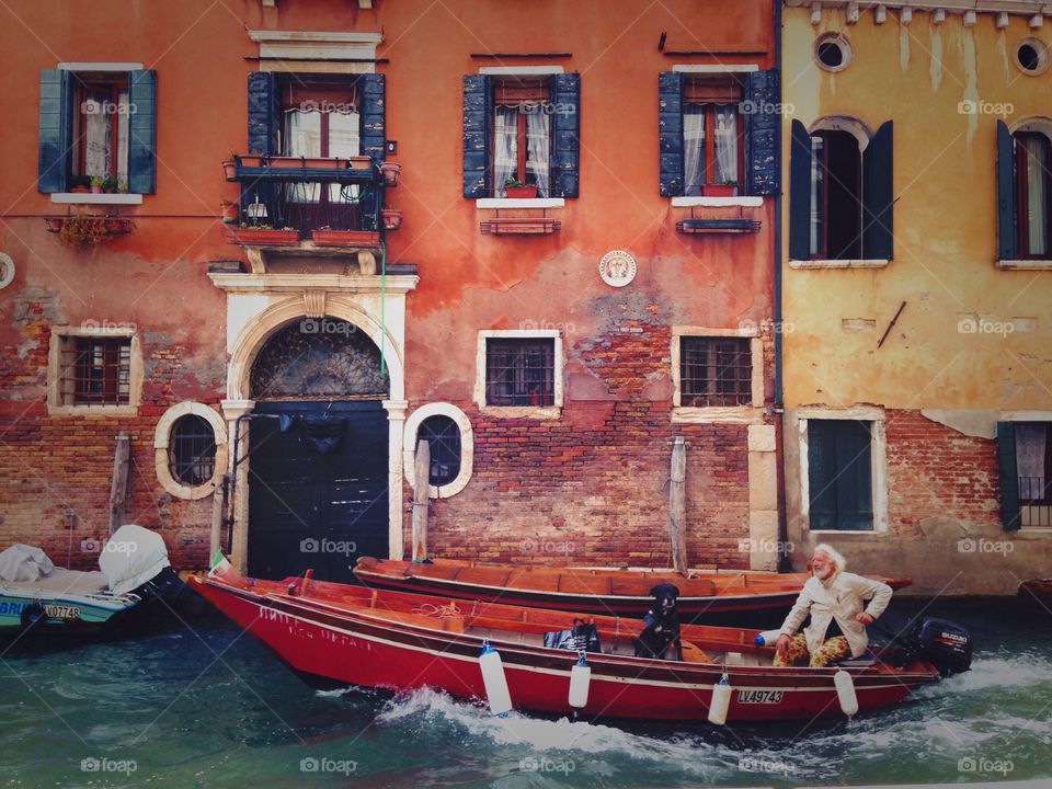man with his dog in gondola