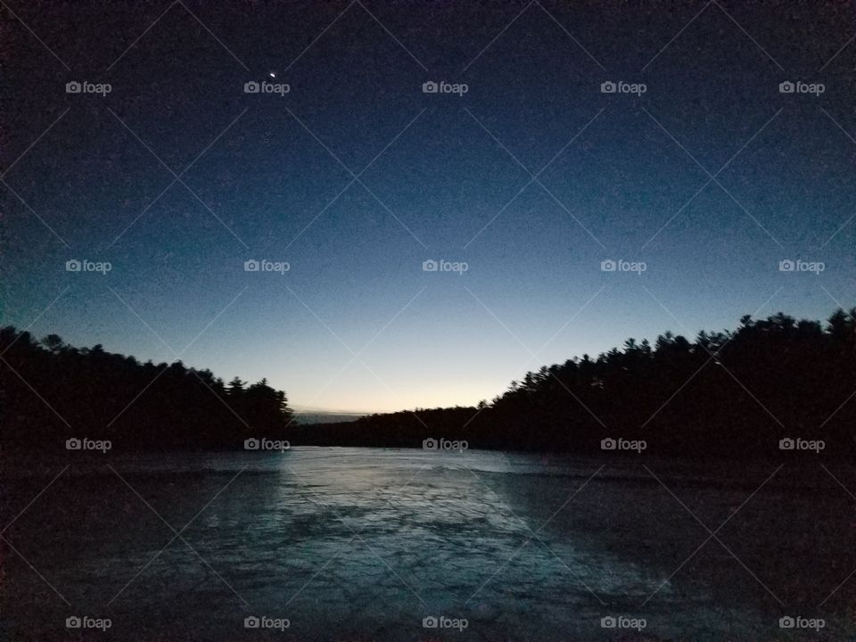 stars in the sky sliding around across the slick of the ice, make your eyes slide around the beauty of the night