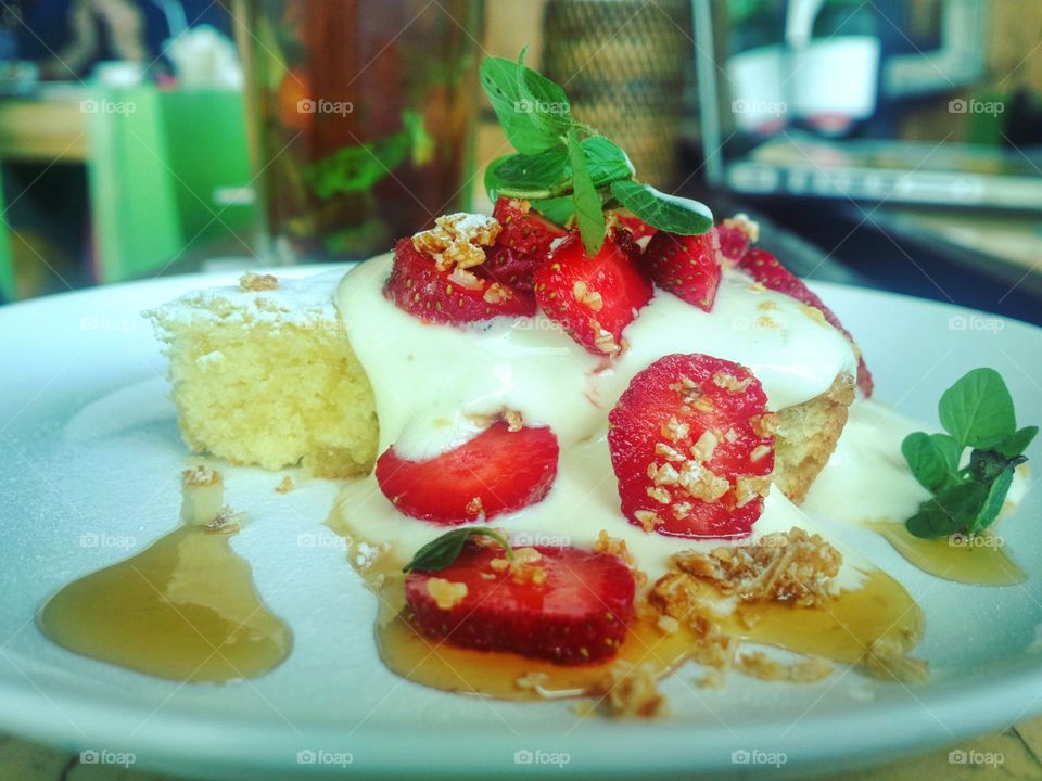Angel Cake, yogurt frosted, marinated with fresh strawberries