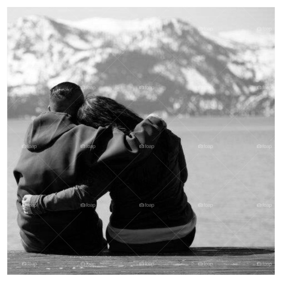 Quiet moment at the lake. Enjoying a moment by snow capped mountain in Lake Tahoe 