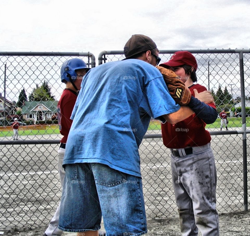Little League Coach and Player. Coach and player baseball little league