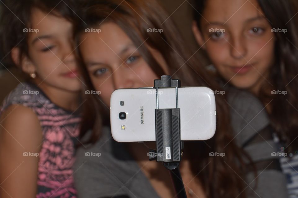 Three girls taking a selfie