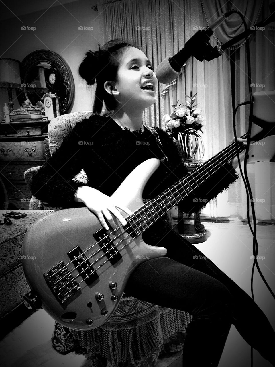 My little girl singing & playing her Bass Guitar 