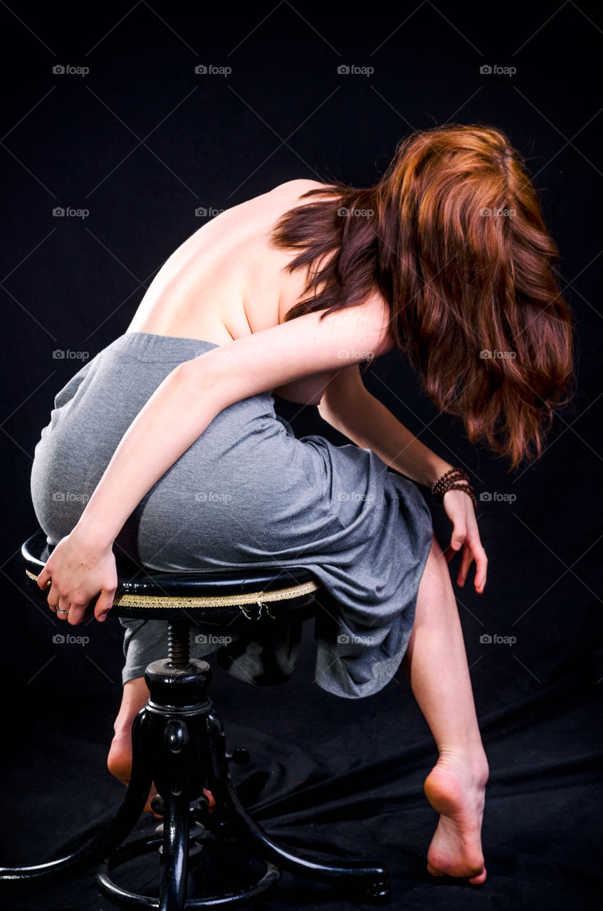 Woman Partially Nude on Chair