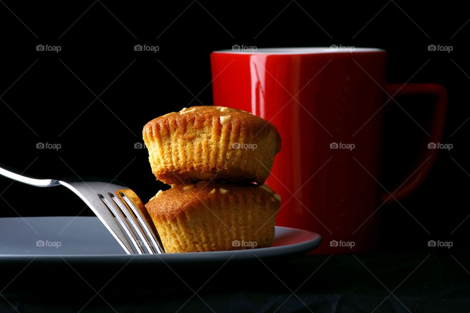 butterscotch bars on a plate and a coffee mug