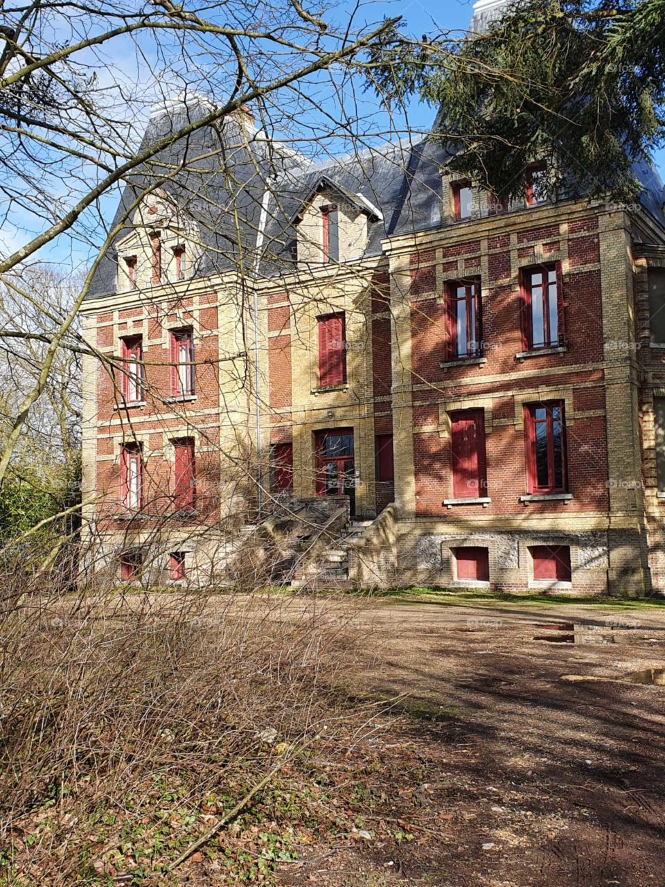 Large detached outdated house.