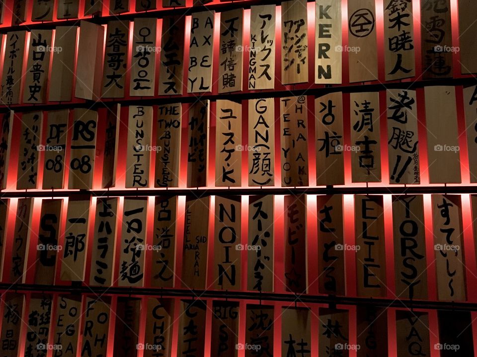 Asian styled wall of names and sayings