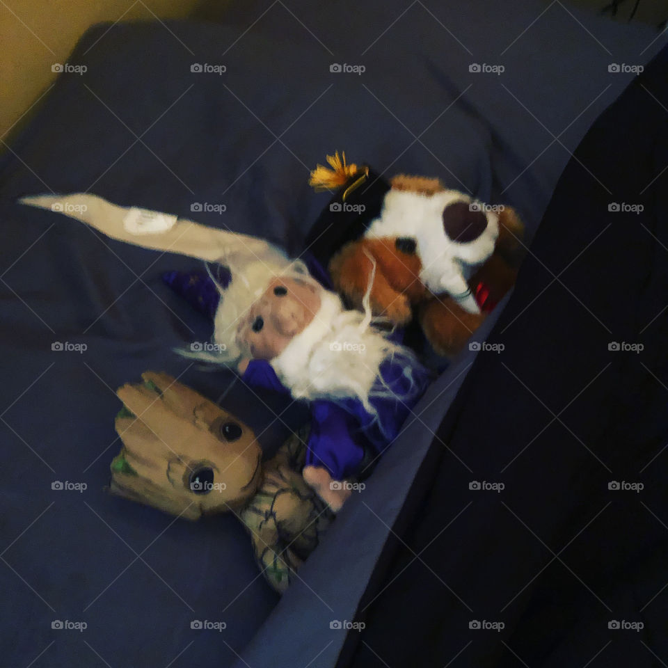 Three stuffed animals going down for a nap. If you enjoy wholesome content, this photo and others in my stuffed animal photography series will be up for sale.