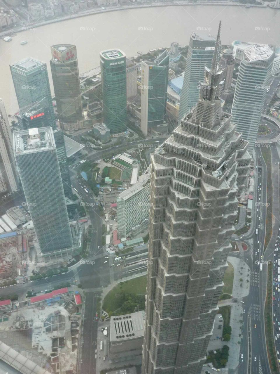 shangai from air. top view of pudong buildings in shangai