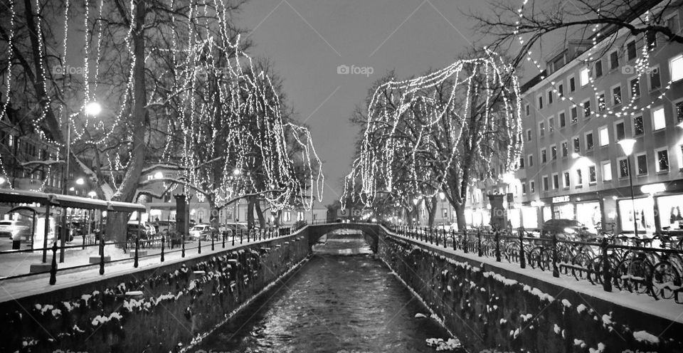 Winter evening in Uppsala. Overlooking the Fyrisån river northwards from Drottninggatan