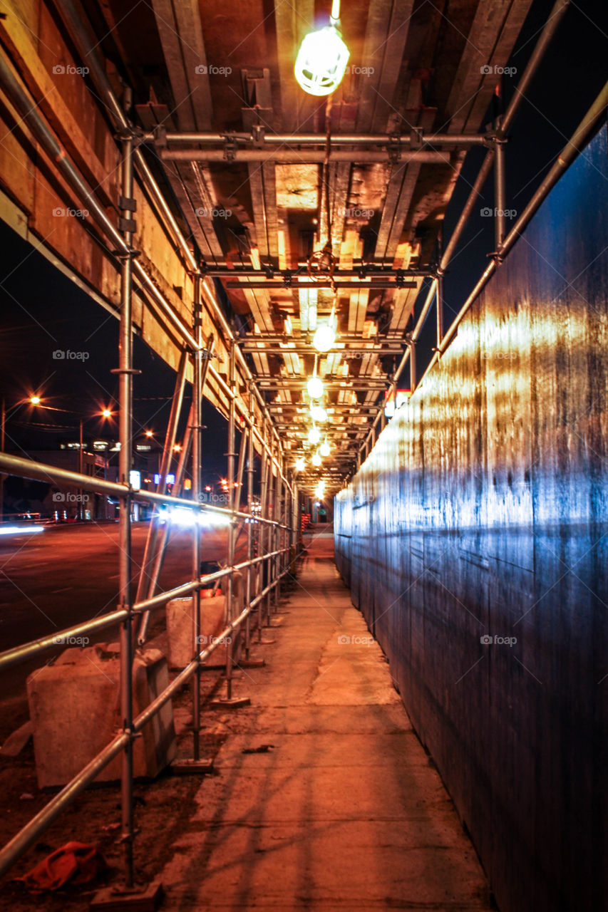 Pedestrian walk under construction, night scene