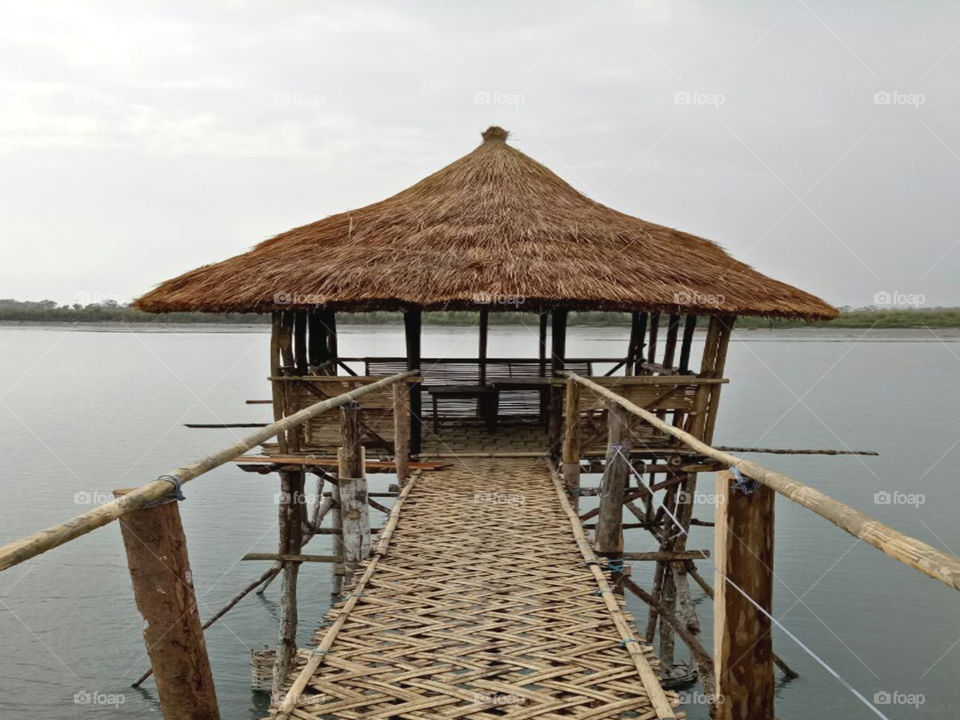 Bamboo hut near the Subansri River. peopls go to visite and take rest that house.