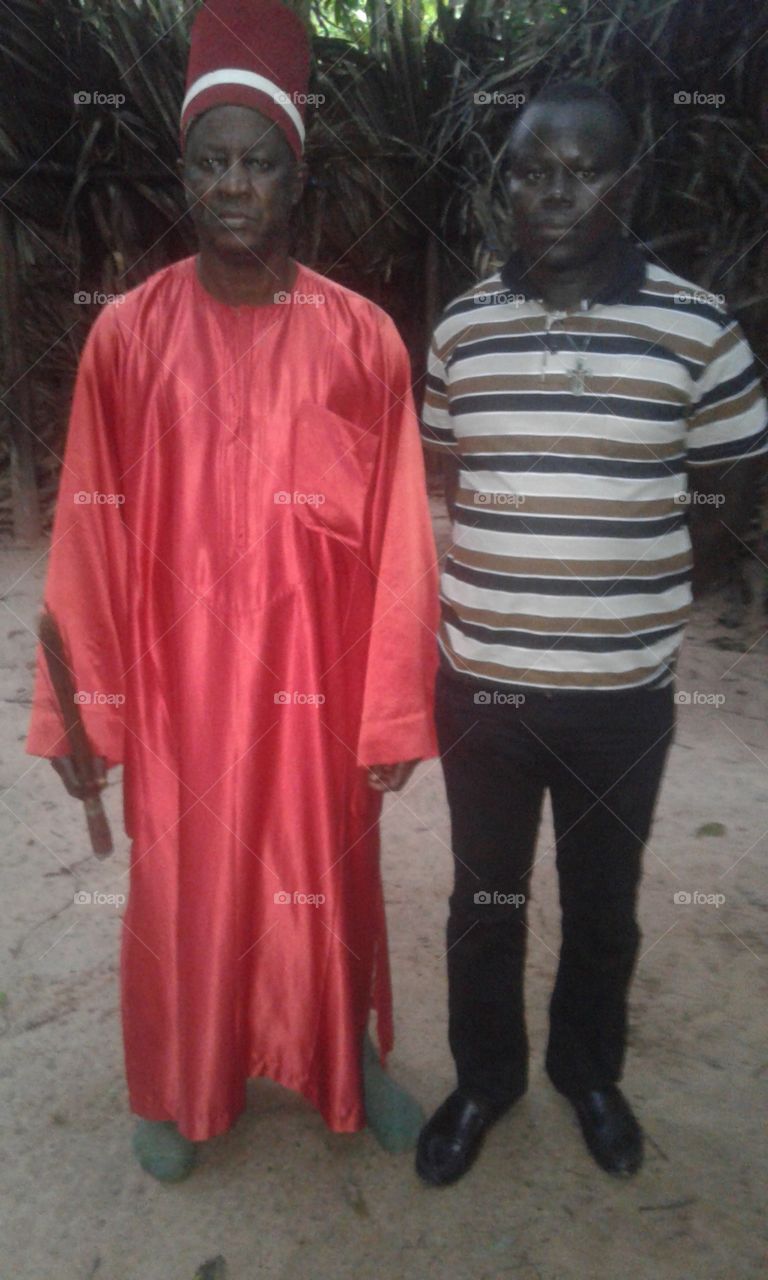 The king of Oussouye with English teacher in seek for knowledge and wisdom