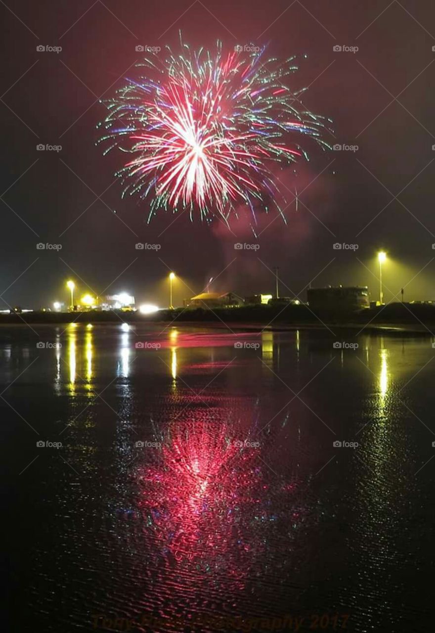 fireworks show off the ocean